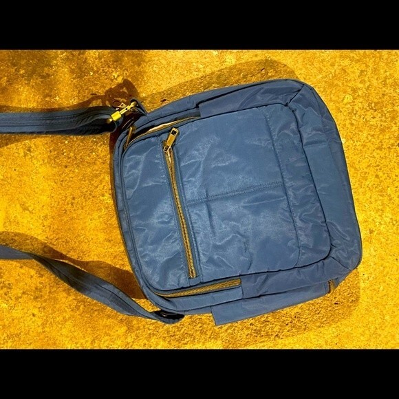 Travelon Handbags - Travelon bag womens blue anti theft crossbody bag Used once